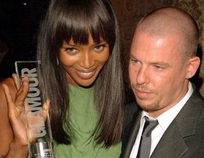 Alexander McQueen poses with model Naomi Campbell