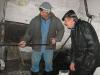 Истопник Валерий Нечипорук и умелец Сергей Ляшок демонстрируют работу котельной, чей коэффициент полезного действия значительно превосходит промышленные образцы.